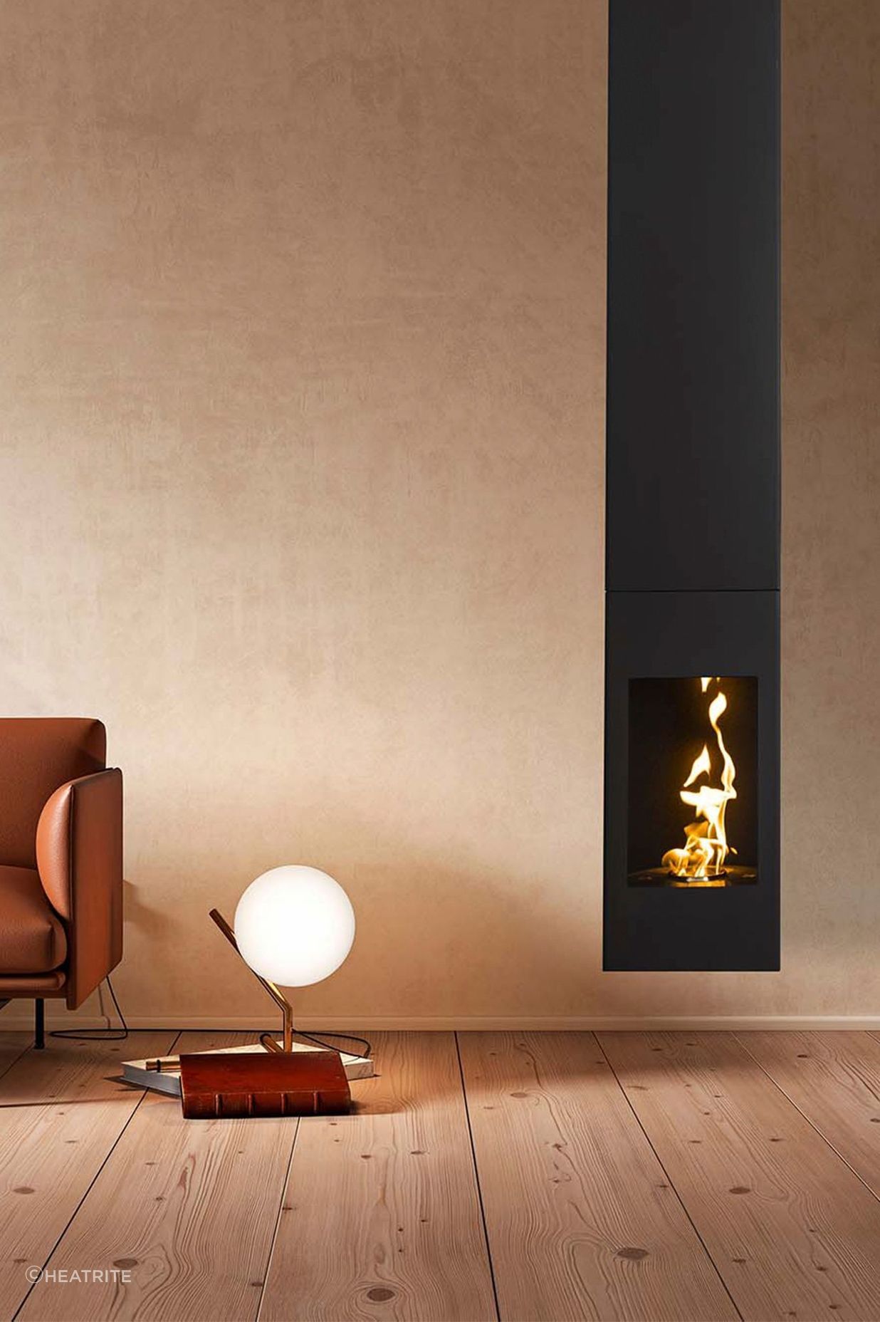 The Aurora 'Evolve' suspended fireplace carries the minimality of the interior's aesthetic