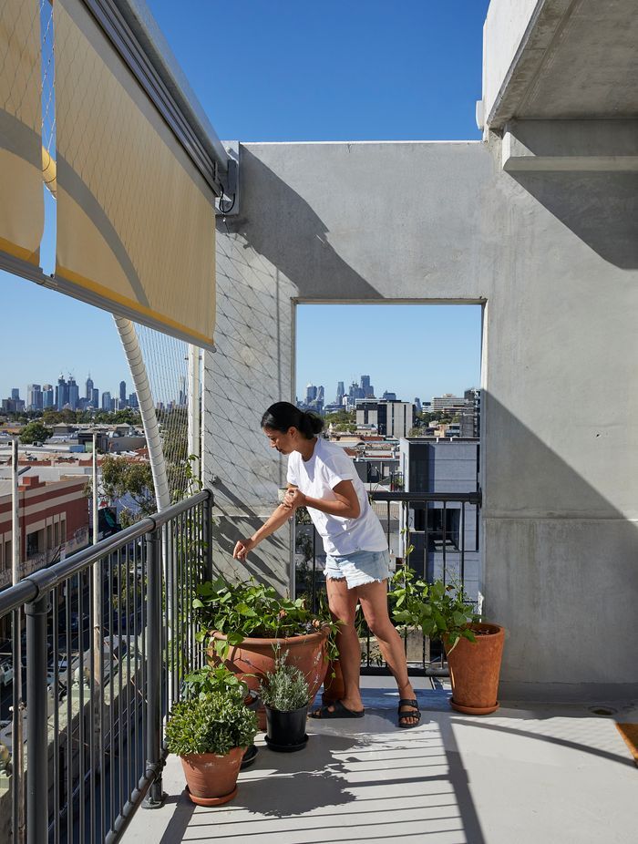 A resident is able to control shading from her terrace.