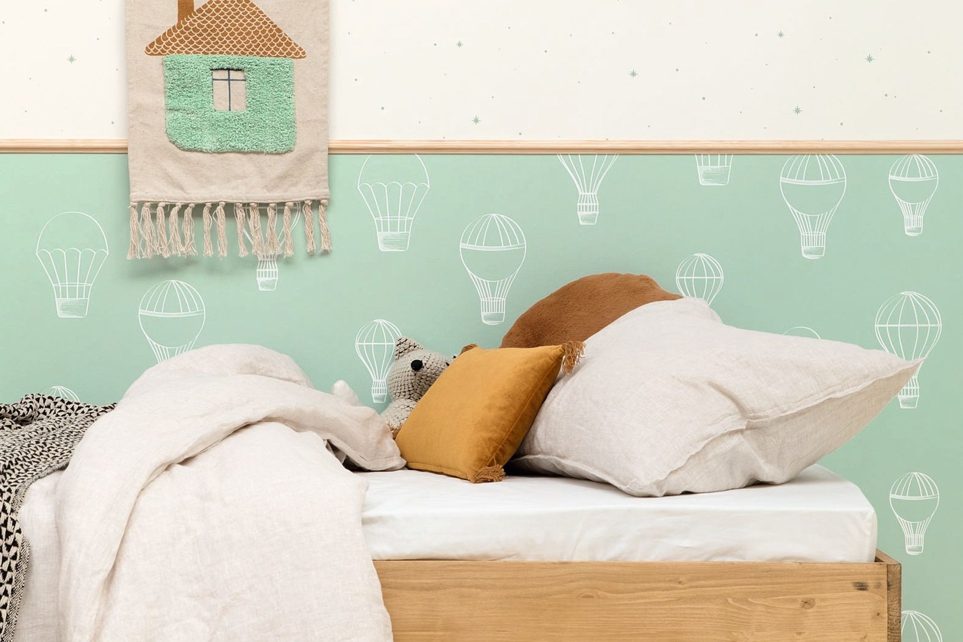 The Autour Du Monde Wallpaper Collection is the perfect choice for a stylish children's bedroom.