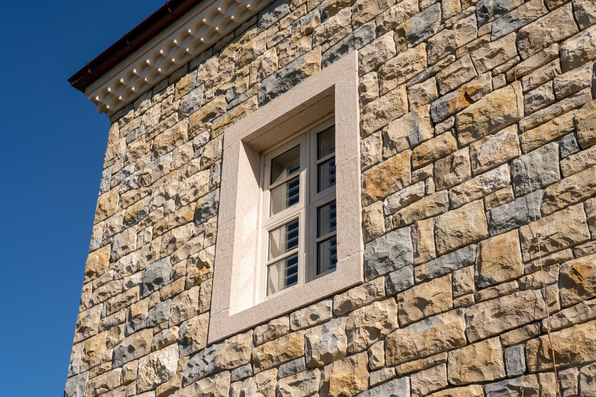 The stonework was purposefully laid to look imperfect and asymmetrical, to better suit the rustic, rural feel.