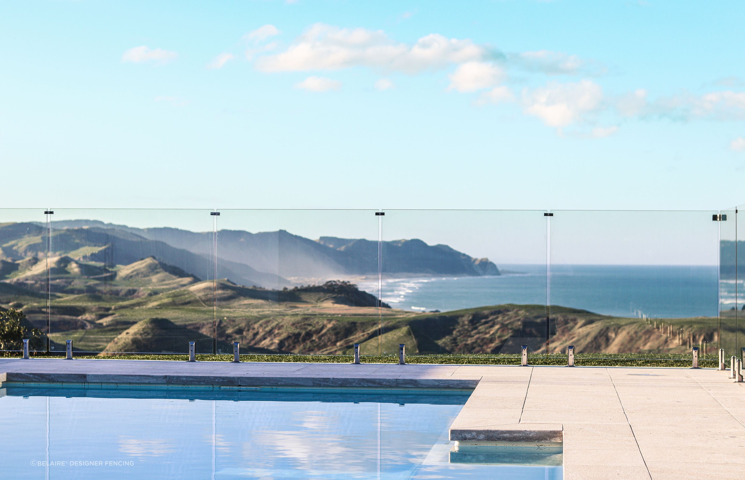 Robust construction with designer styling — a BelAire® Frameless Glass Pool Fencing solution.