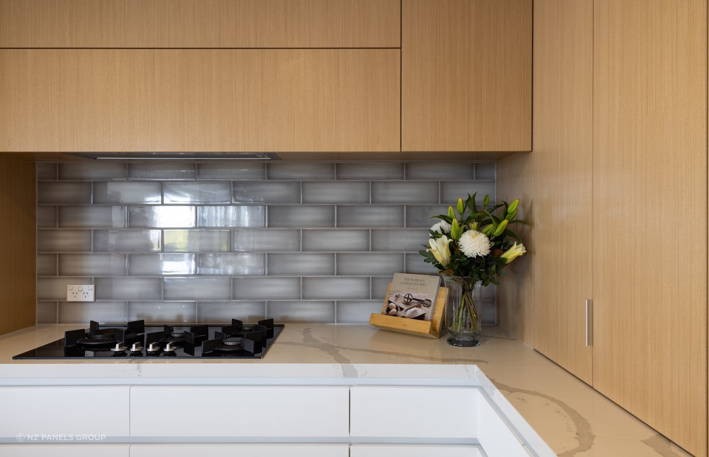 The quarter-cut veneer features a consistent and seamless grain.