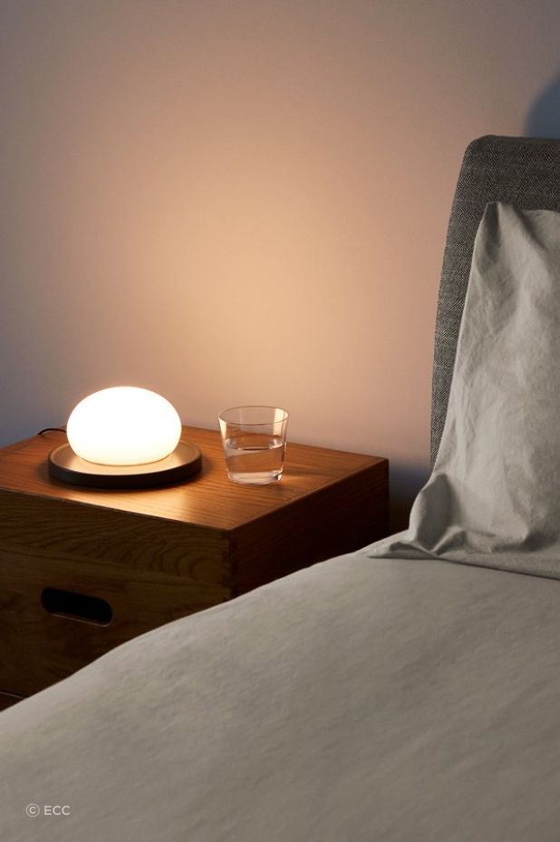 A movable glass sphere for activation is just one of the great features of the Bolita Table Lamp.