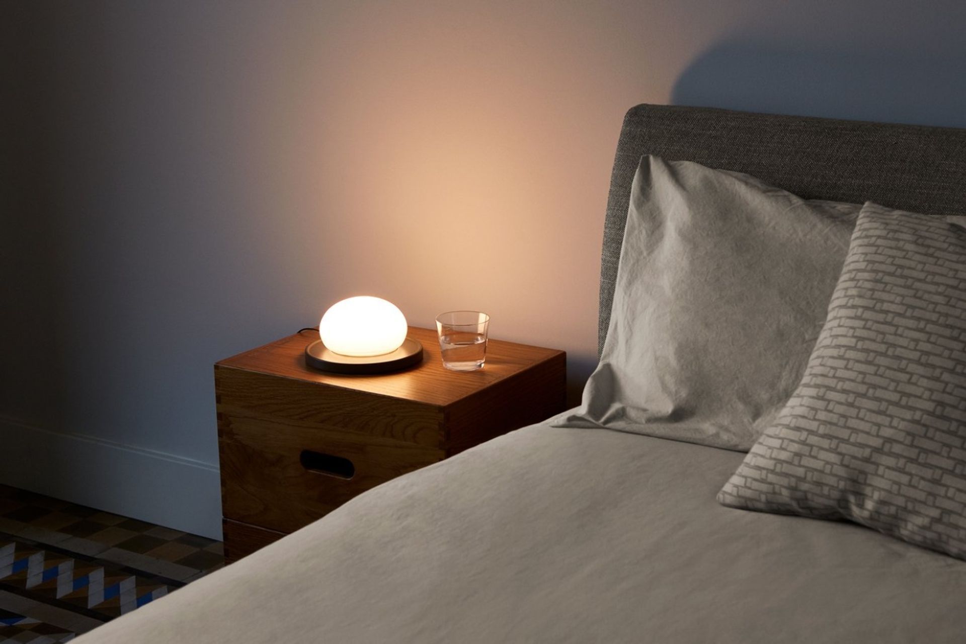 A movable glass sphere for activation is just one of the great features of the Bolita Table Lamp.
