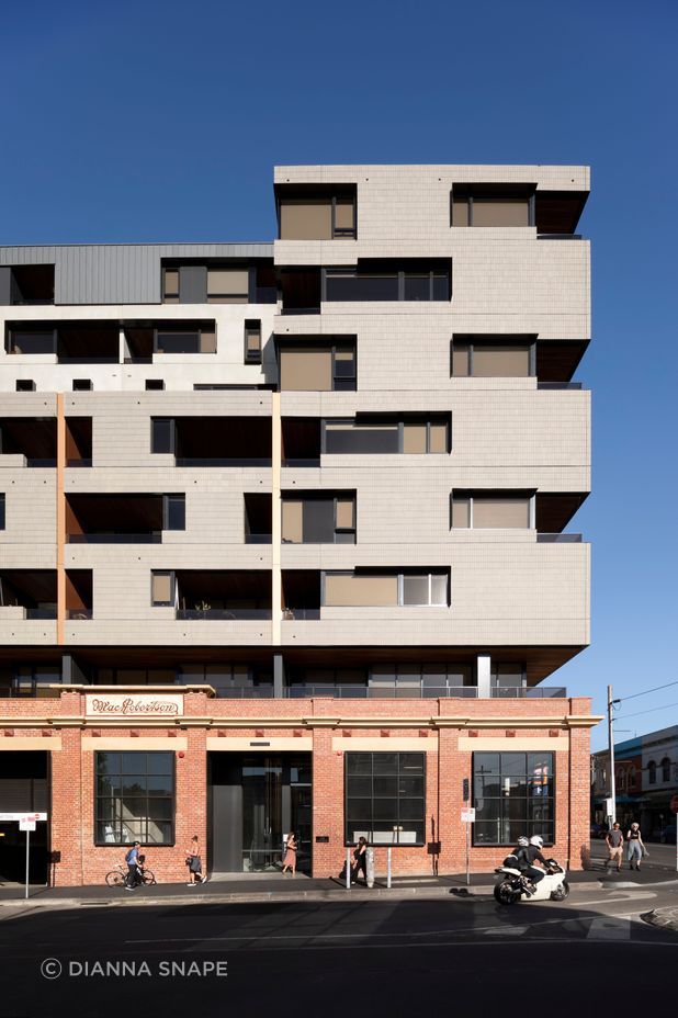 The Lyric’s Brick Inlay façade of ash grey tiles pays homage to Fitzroy’s industrial character.