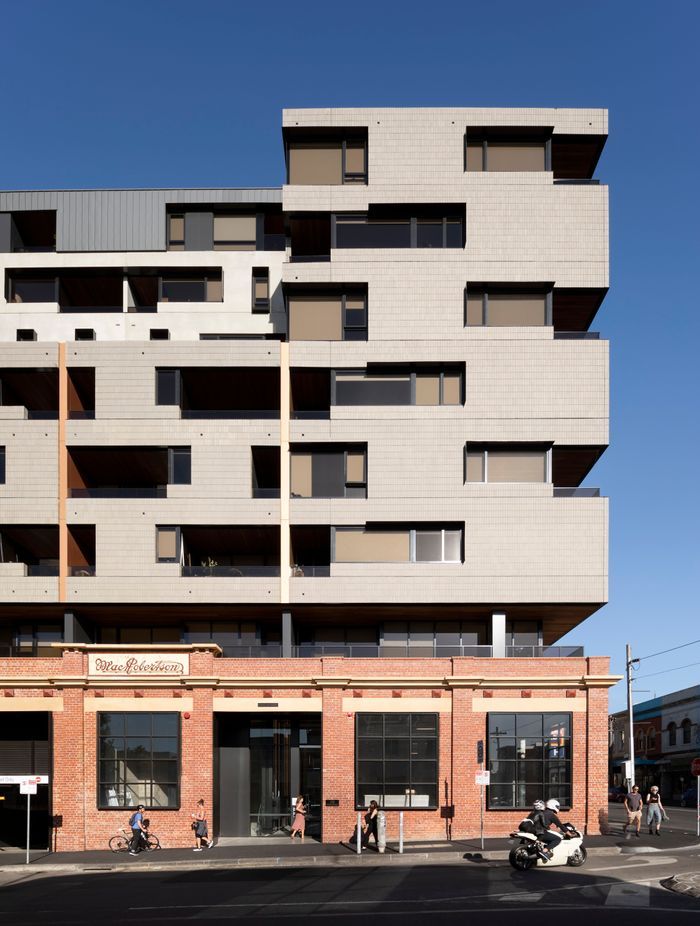 The Lyric’s Brick Inlay façade of ash grey tiles pays homage to Fitzroy’s industrial character.