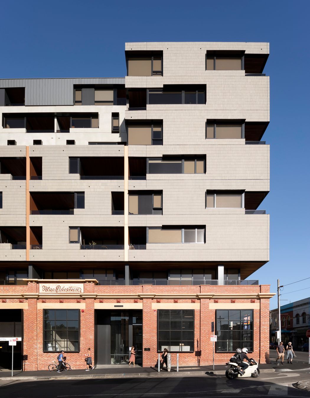 The Lyric’s Brick Inlay façade of ash grey tiles pays homage to Fitzroy’s industrial character.