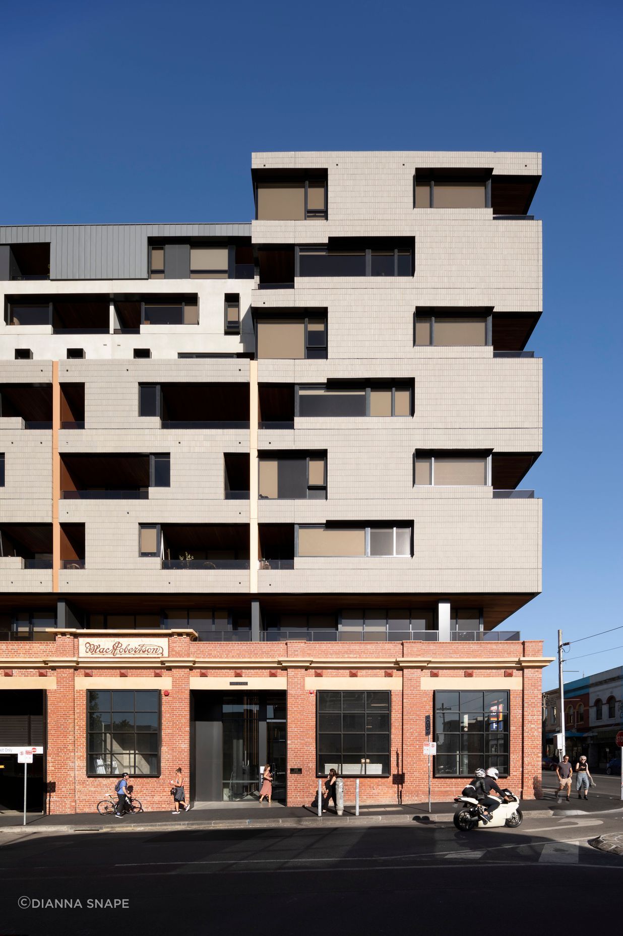 The Lyric’s Brick Inlay façade of ash grey tiles pays homage to Fitzroy’s industrial character.