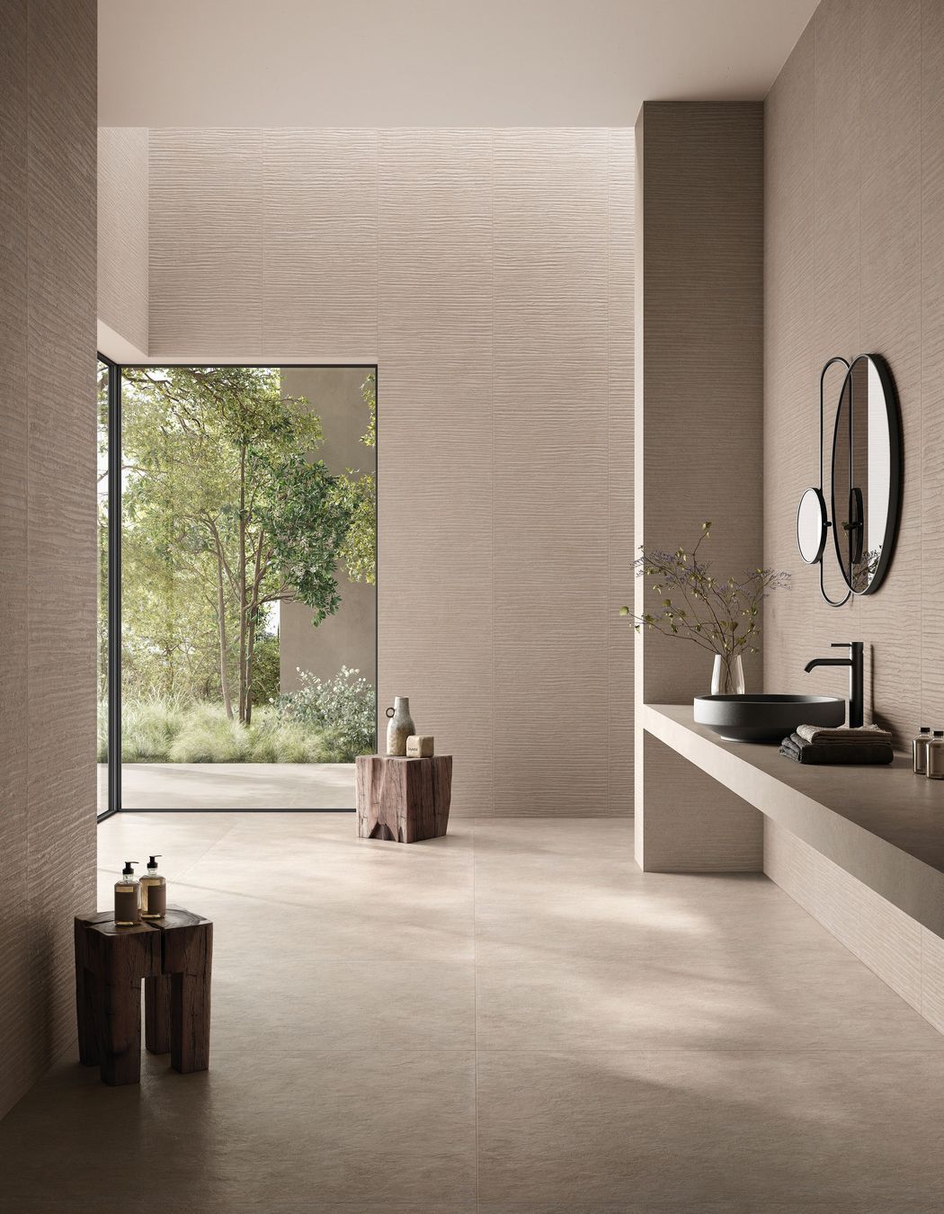 This bathroom has a handmade feel and features the Cement Vibes in Fango from The Tile Depot.
