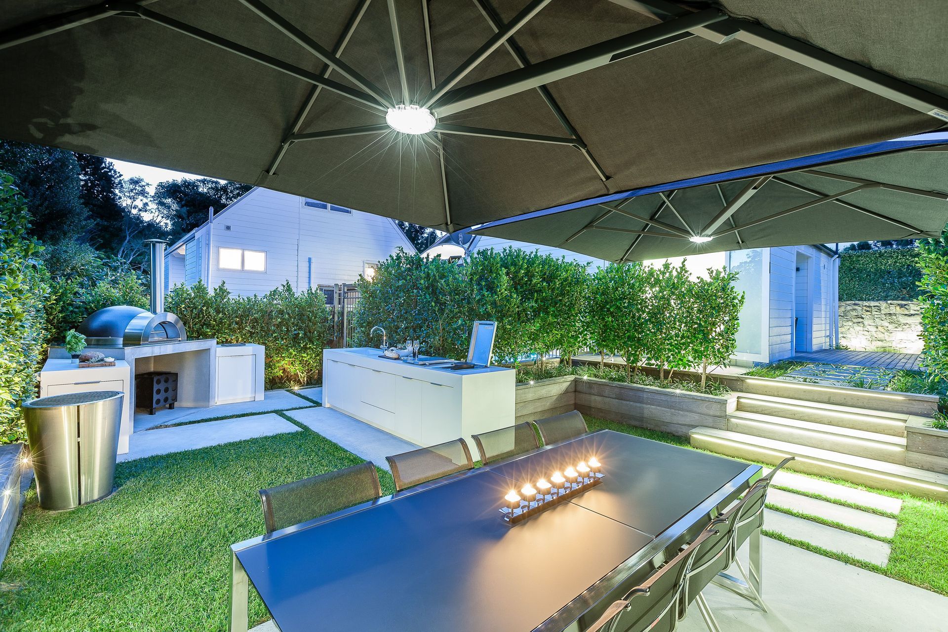A great example of outdoor umbrella lighting in this residence in Mt Eden.