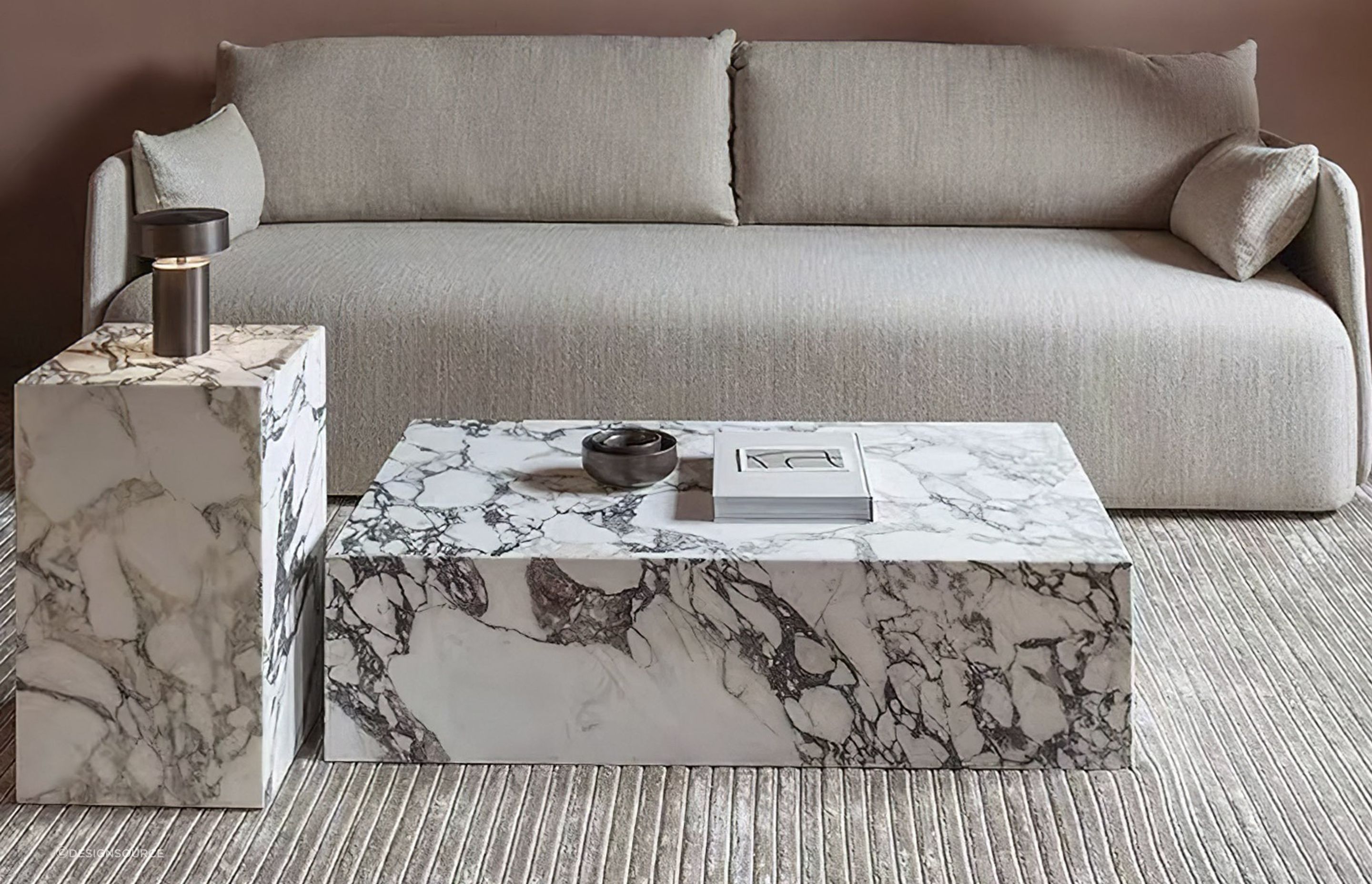 The beautiful veining of the Italian marble plinth is a real showstopper for the Calacatta Viola Side Table and its coffee table equivalent.
