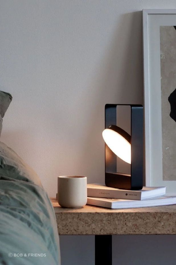 Powered by a rechargeable battery, the Case Mouro Lamp is a versatile, portable lighting solution.