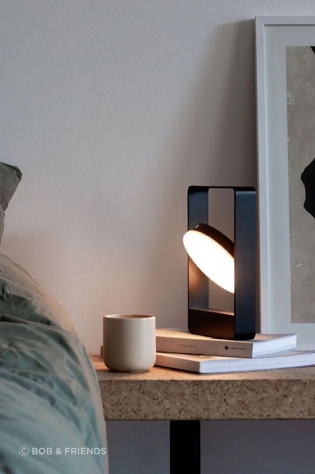 Powered by a rechargeable battery, the Case Mouro Lamp is a versatile, portable lighting solution.