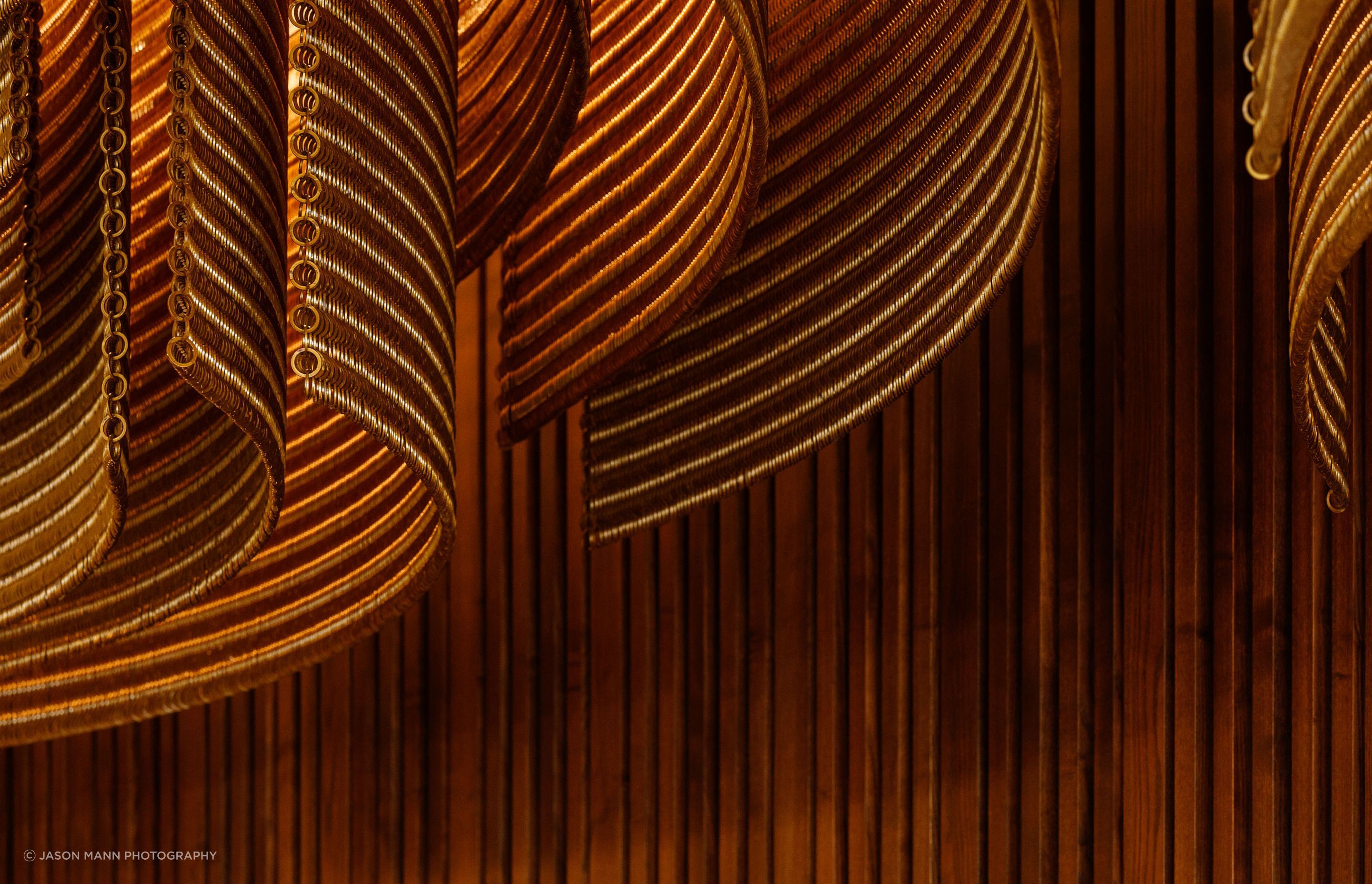 A close-up view of the mesh, which consists of thousands of interlocked rings which evoke the form of chainmail.