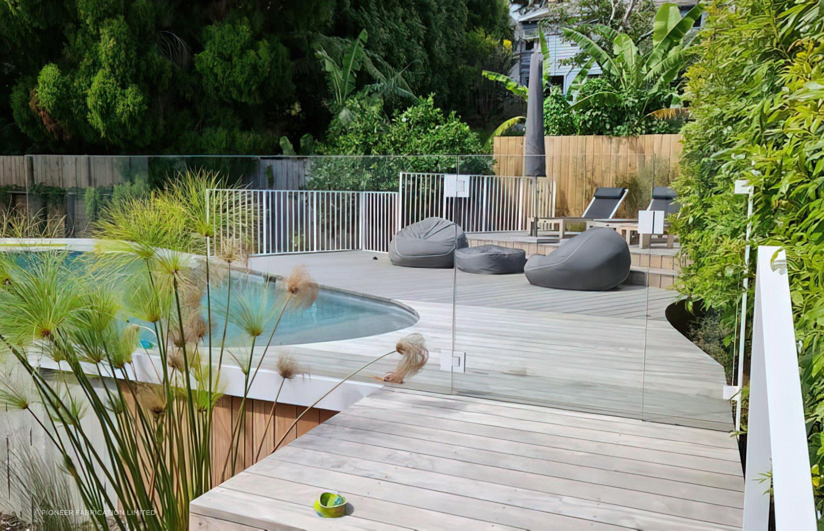 Glass fencing is a great way to keep your pool area safe without compromising on style, seen here with Pioneer Fabrication Limited