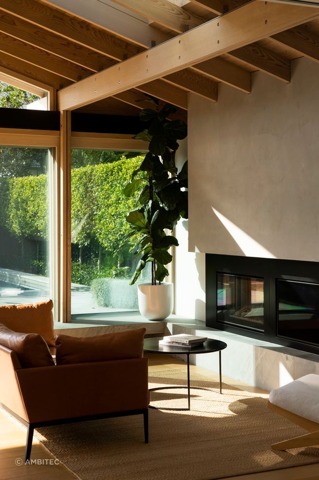 Ambitec Suave in ‘Grey Grey’ was rendered on the fireplace in this bungalow renovation by Sayes Jackson Architects.