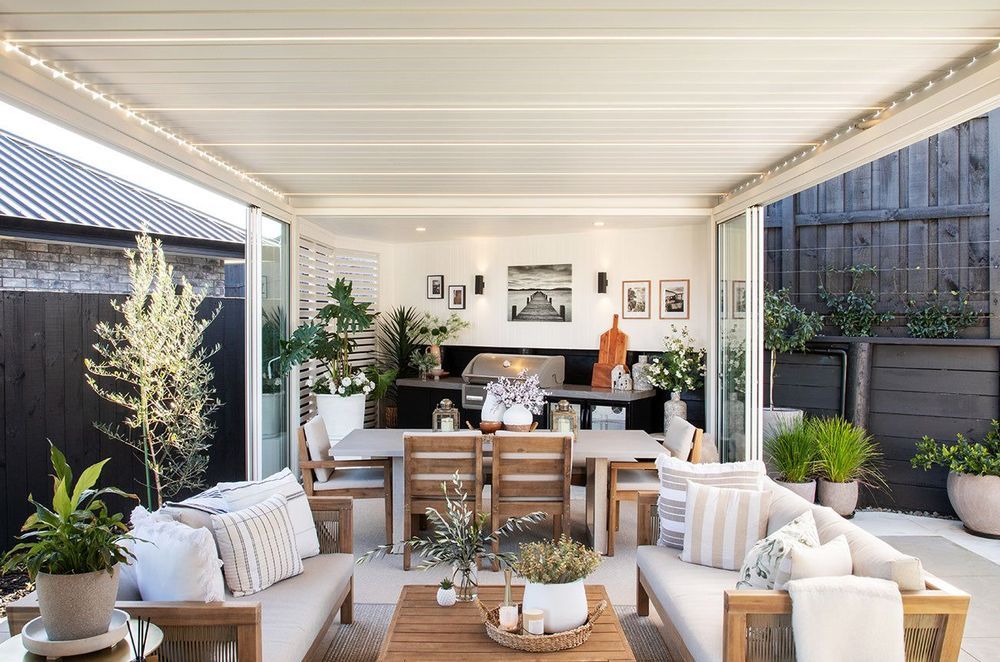 Modern louvred pergola systems can be fitted with a range of accessories like glass doors and lighting.