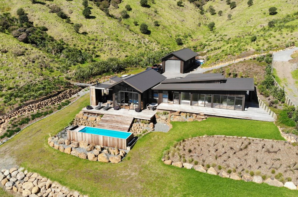 Dimond provided the roofing for both the main house and the boat shed.