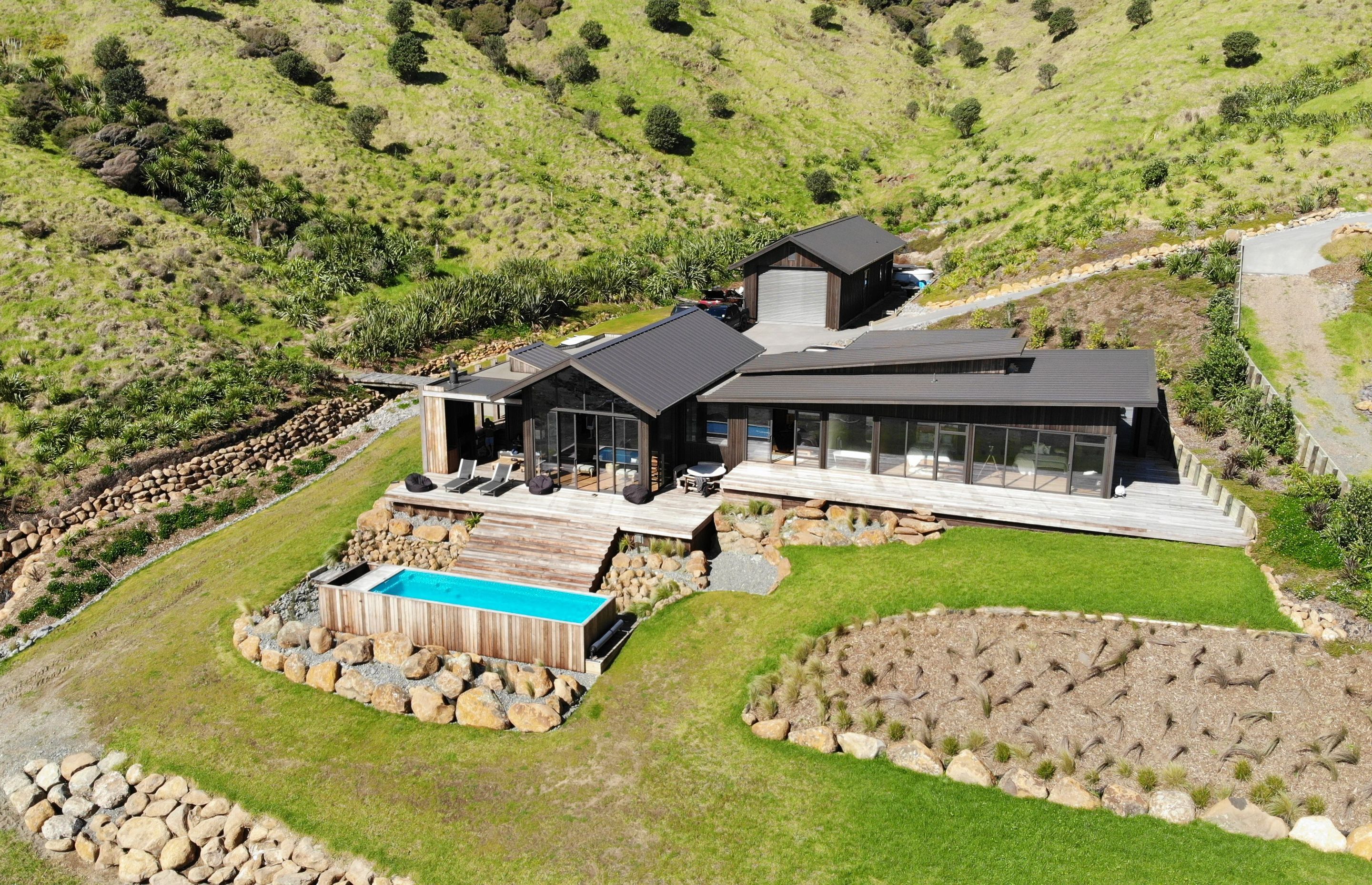 Dimond provided the roofing for both the main house and the boat shed.