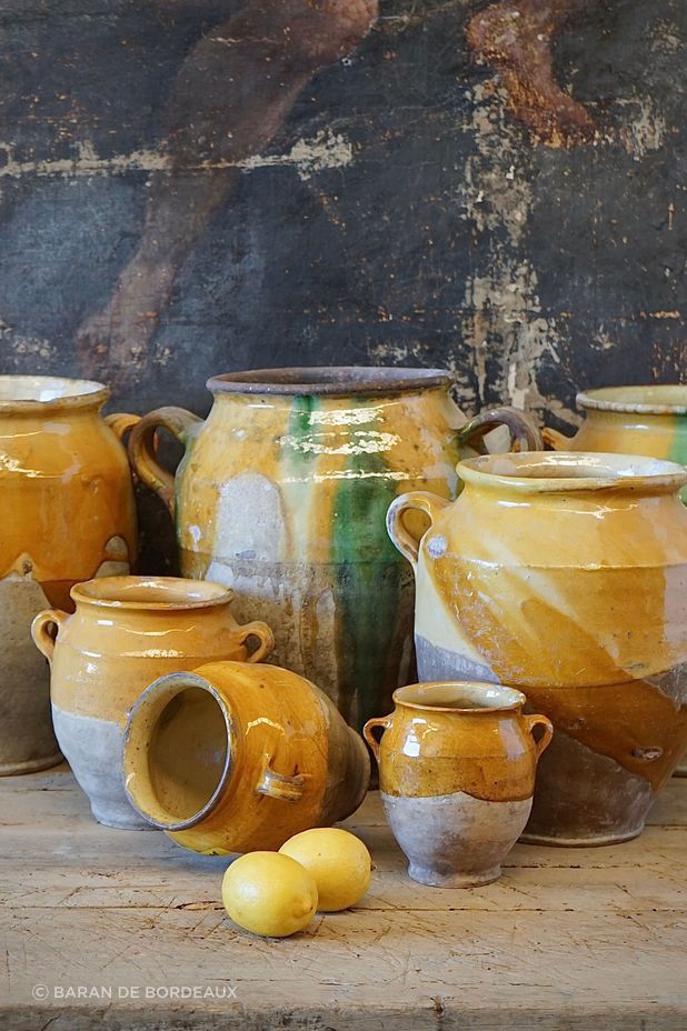 French antique confit pots are a great way of adding texture and a sense of history to an interior.