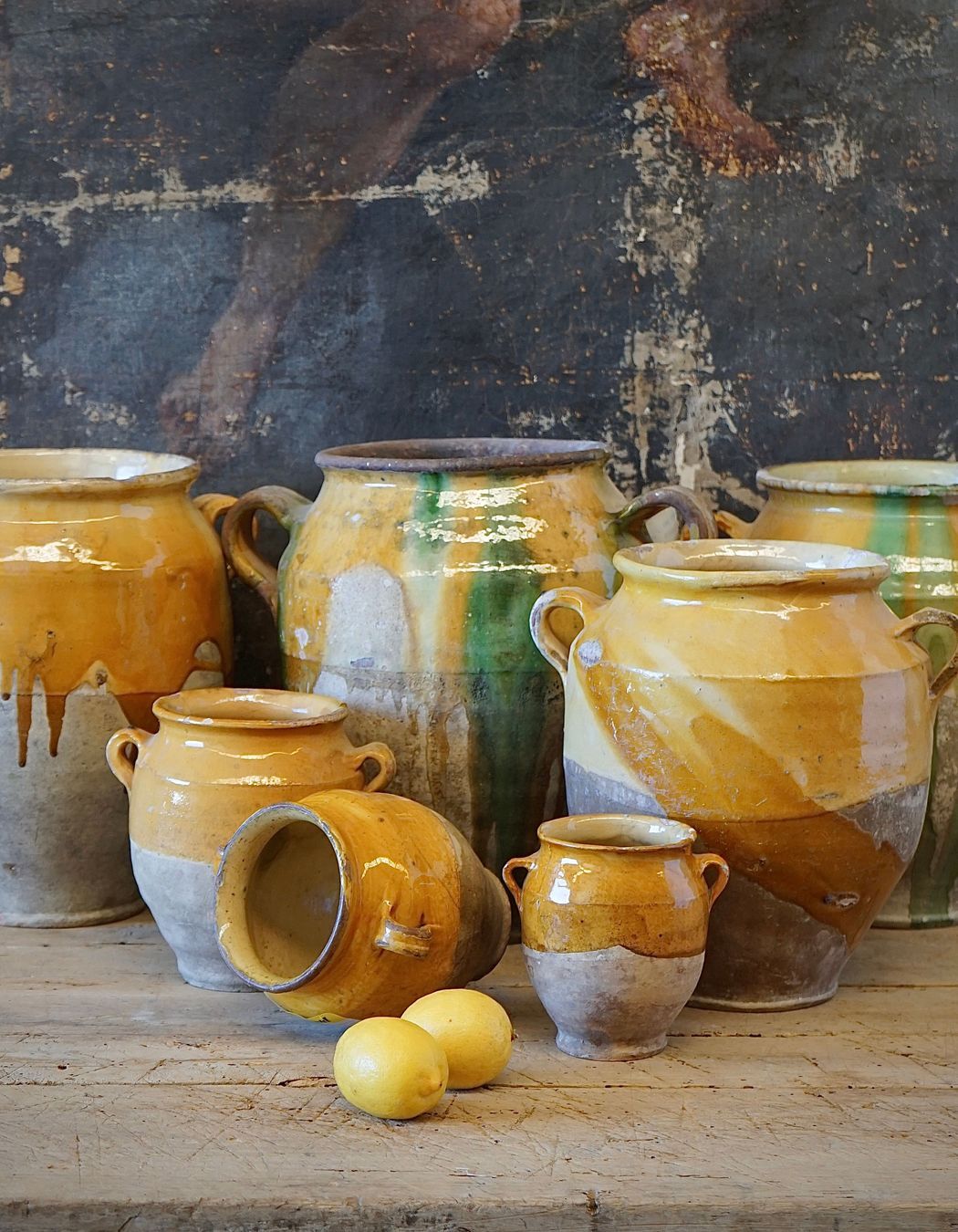 French antique confit pots are a great way of adding texture and a sense of history to an interior.