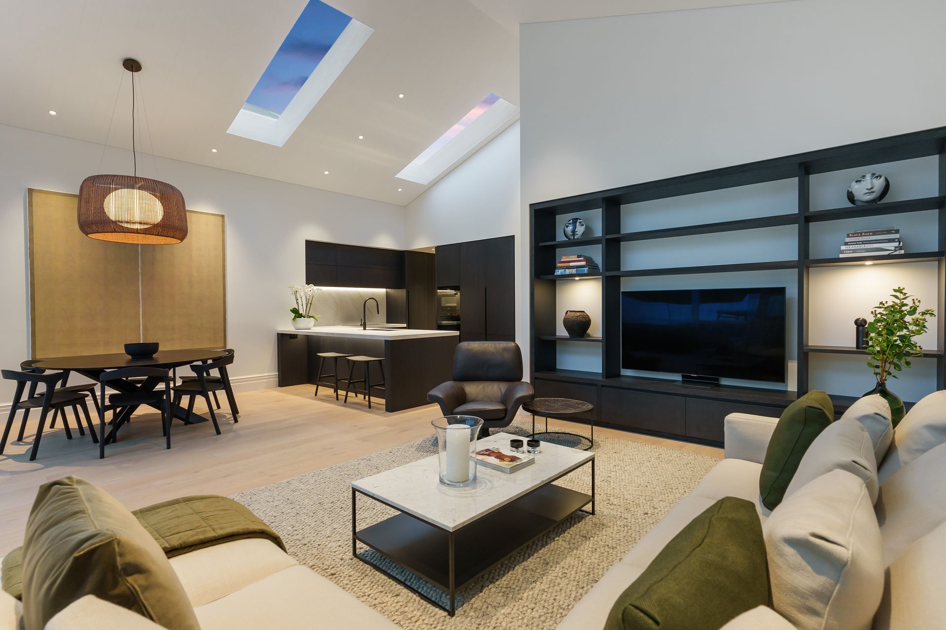 The sleek renovation of this St Mary's Bay villa features a new kitchen and open plan living area.