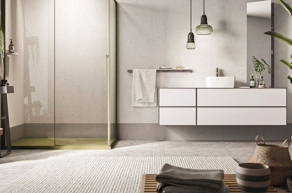 Pendant lights are a great choice above a vanity for bathrooms with high ceilings, seen here with the Dress Wall Hung Vanity by Artesi