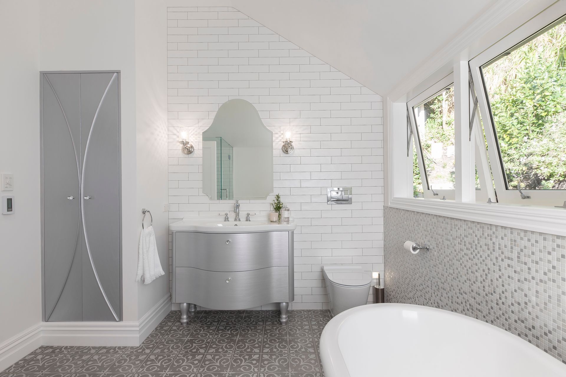 On style with every element, including the bathroom vanity lights in this bathroom renovation in Epsom