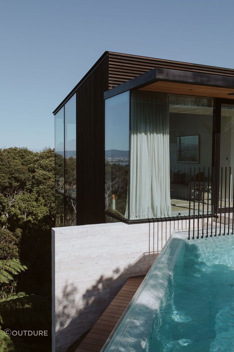 Moisture-proof decking surrounds the infinity pool.