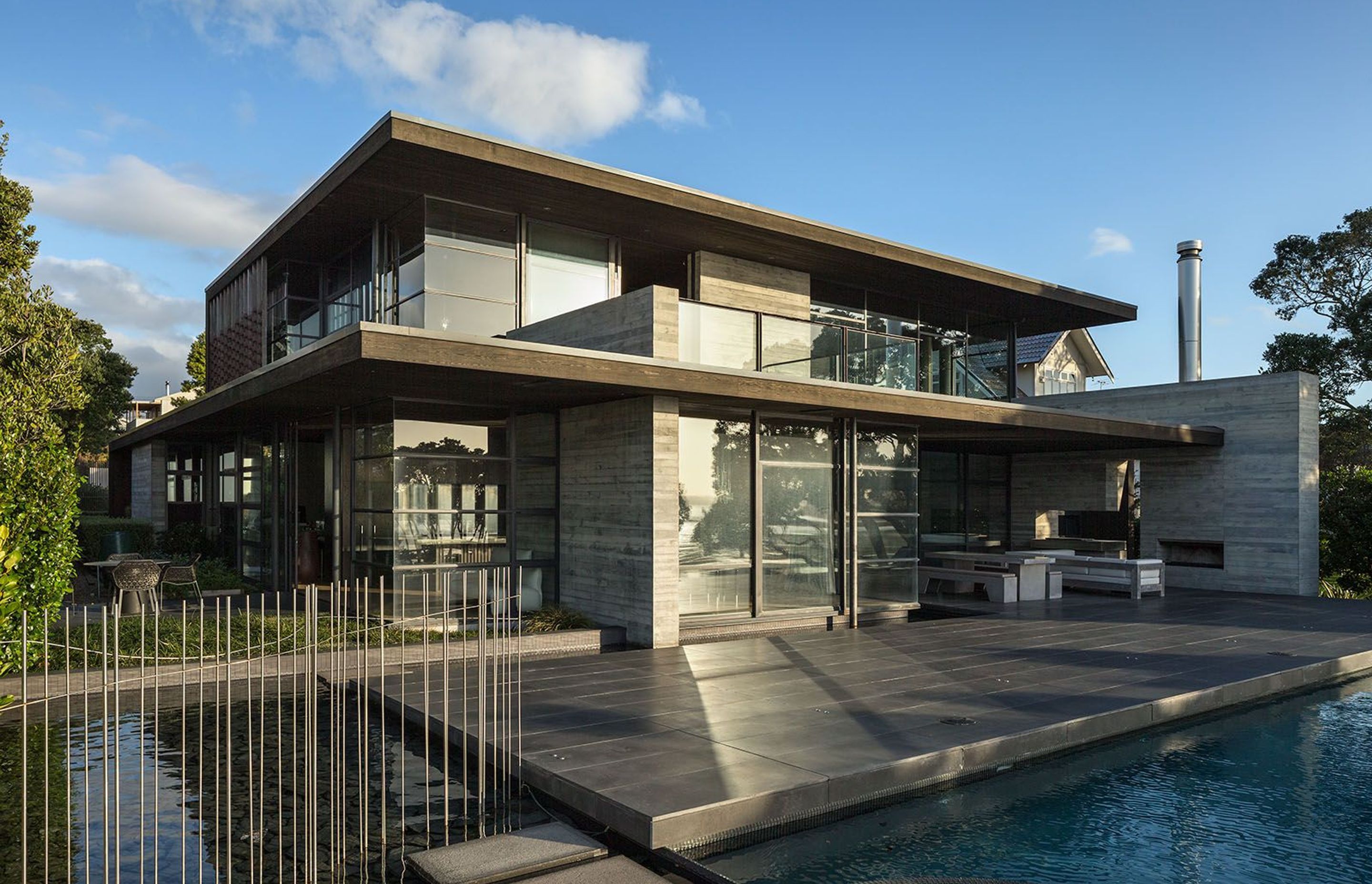 This Westmere home built by Bannan Construction features extensive in situ concrete.