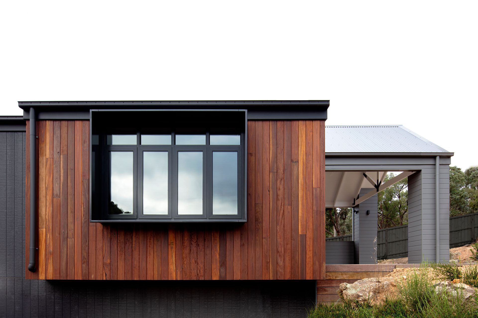 The Core Series HH450 creates a box around the windows of this home, enhancing the façade in a creative and dramatic way.
