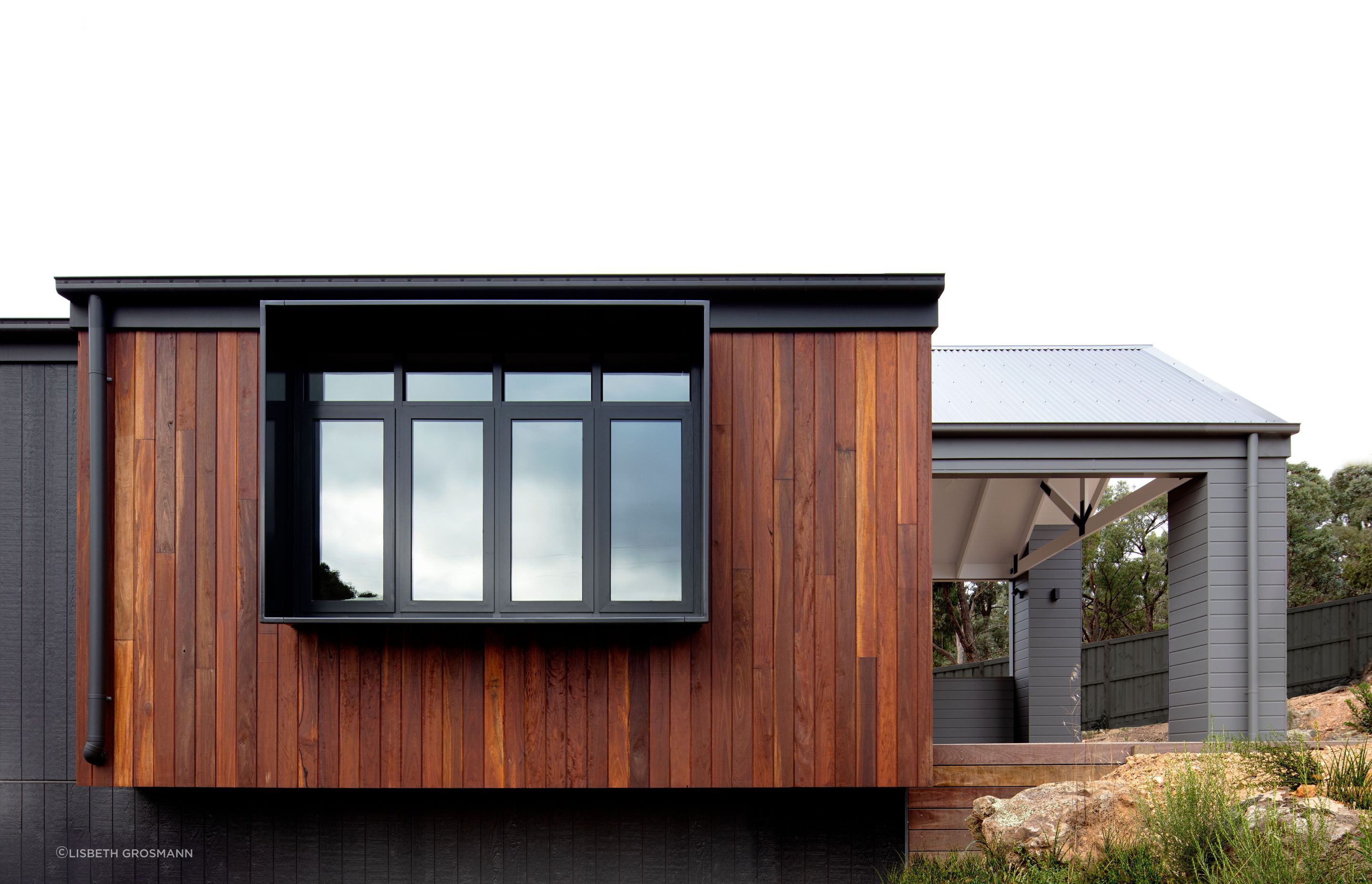 The Core Series HH450 creates a box around the windows of this home, enhancing the façade in a creative and dramatic way.