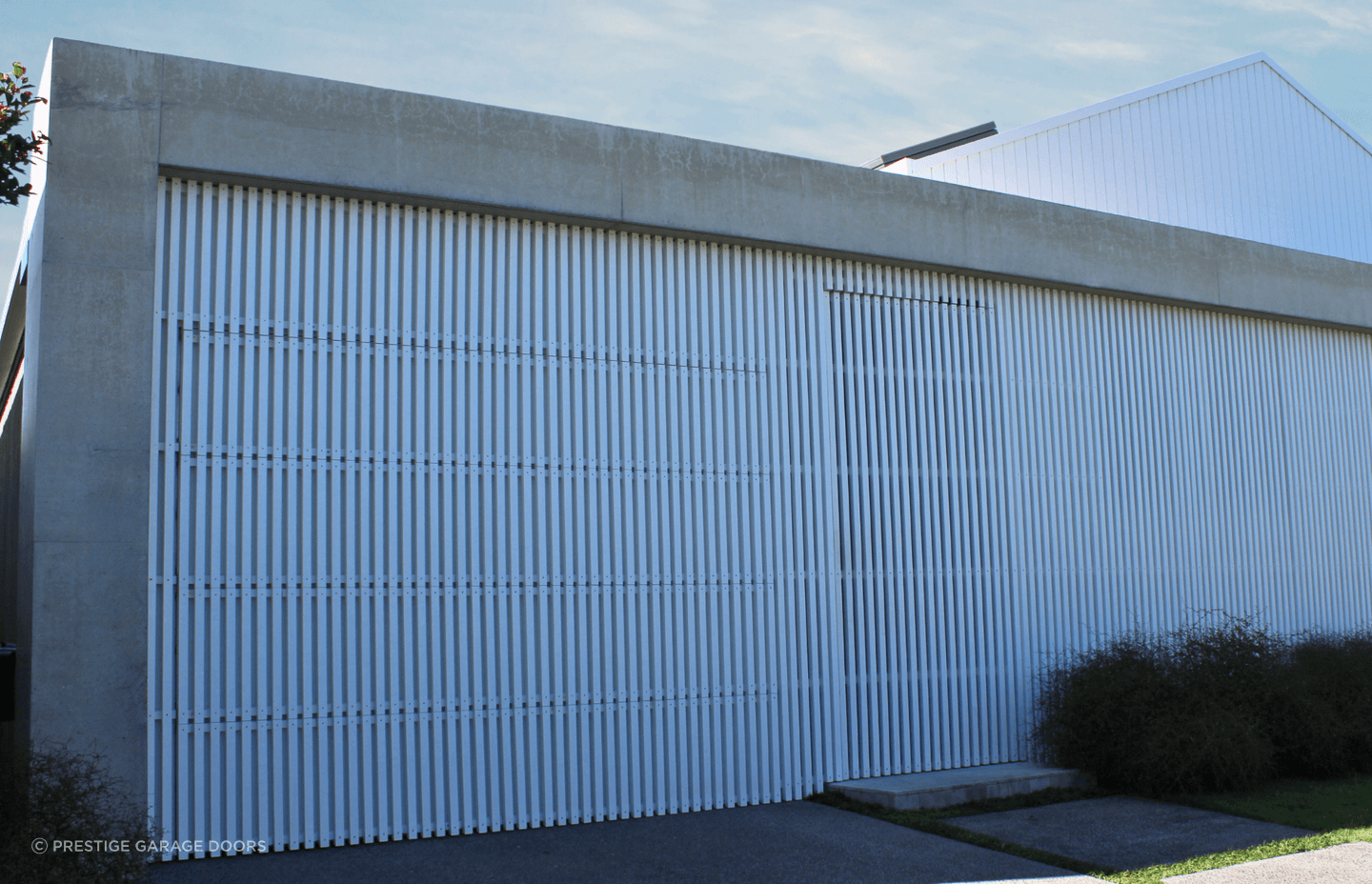 “Our flushmount doors are made so that their exterior finish matches that of the wall around it, finished in line with your wall so it looks like the wall itself.”