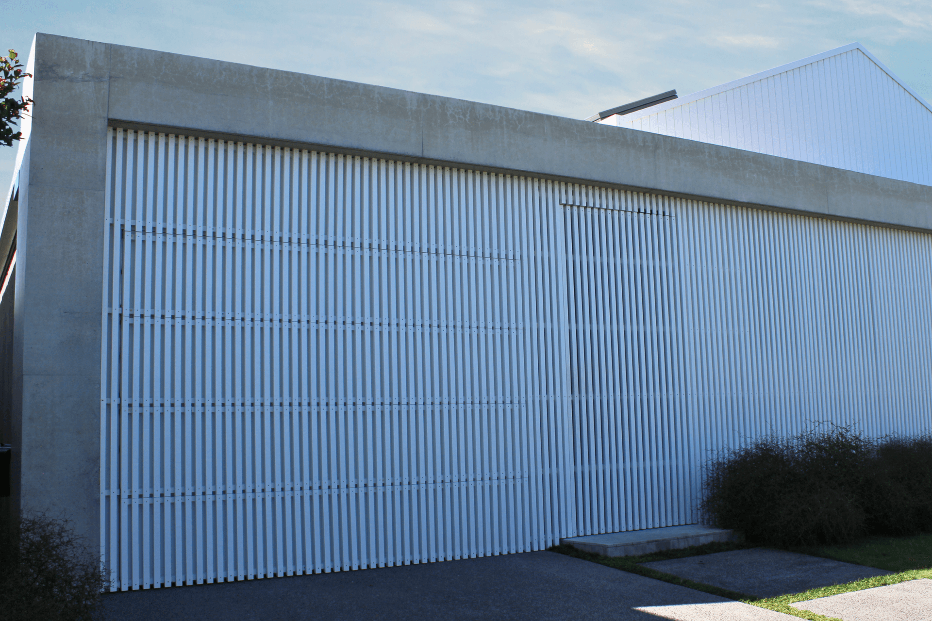 “Our flushmount doors are made so that their exterior finish matches that of the wall around it, finished in line with your wall so it looks like the wall itself.”