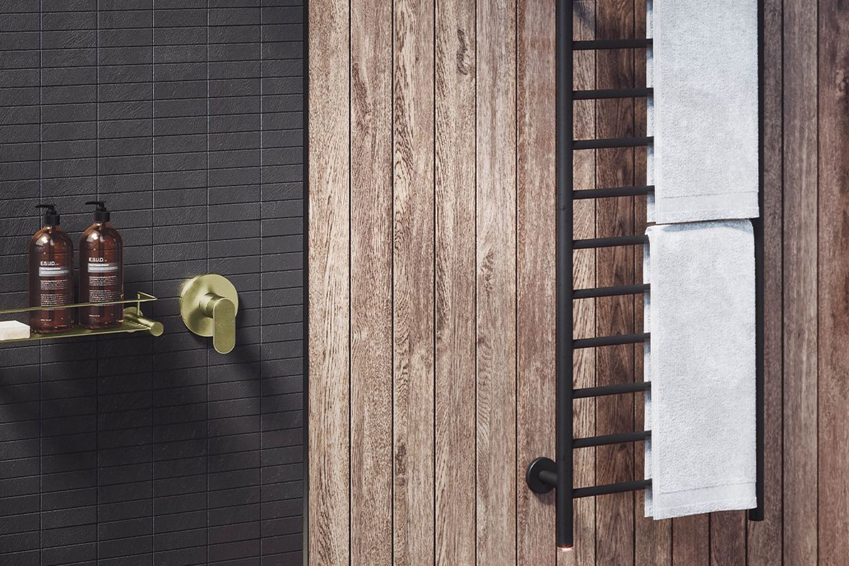 Mix and match with brushed gold and matt black bathroom accessories.