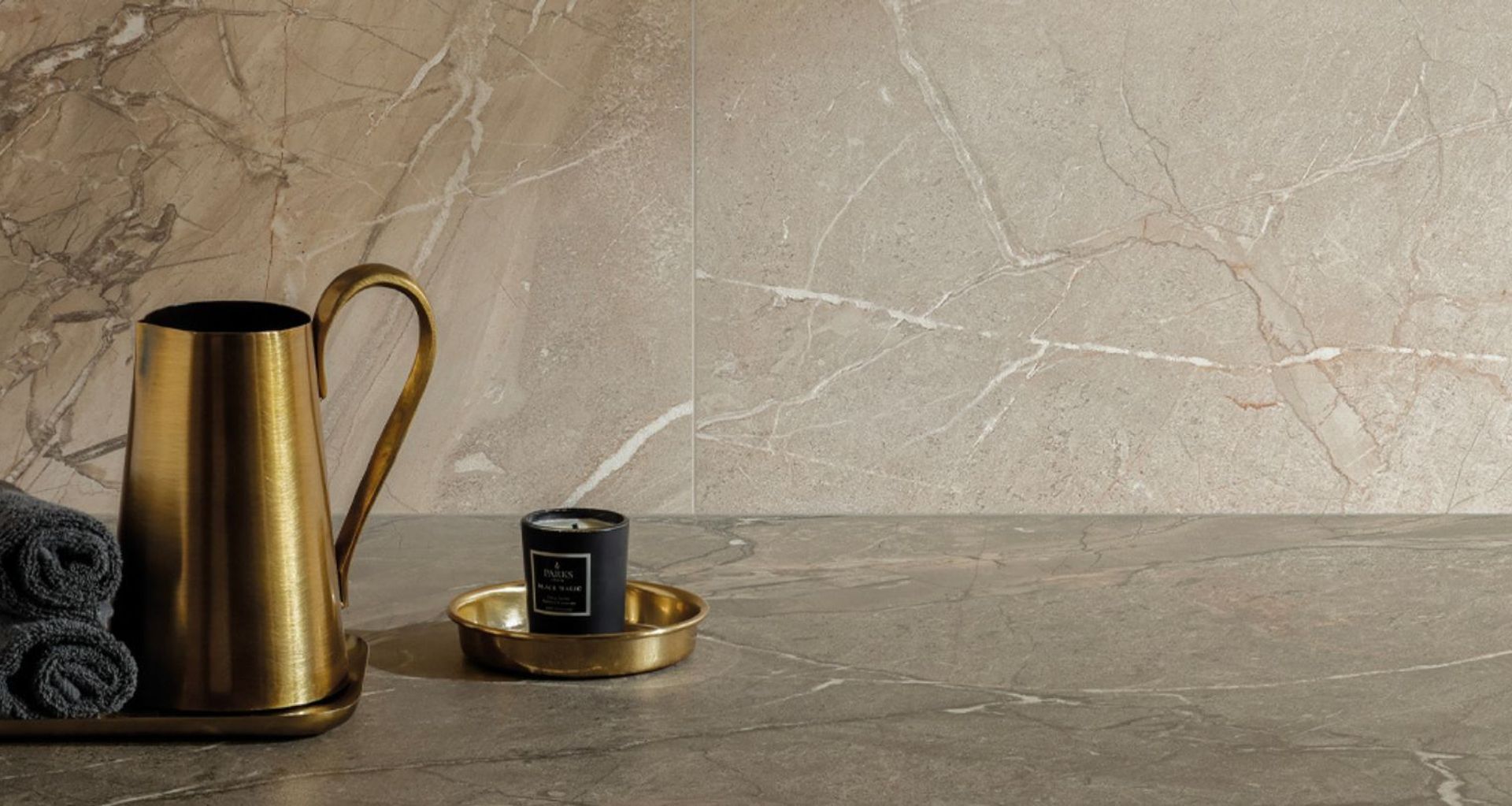 'Amaranto' is a collection of glazed porcelain stoneware with a coloured body. Inspired by natural marble stone with a combination of thick and delicate veins in white, grey and copper that dissect the surface of the base design.