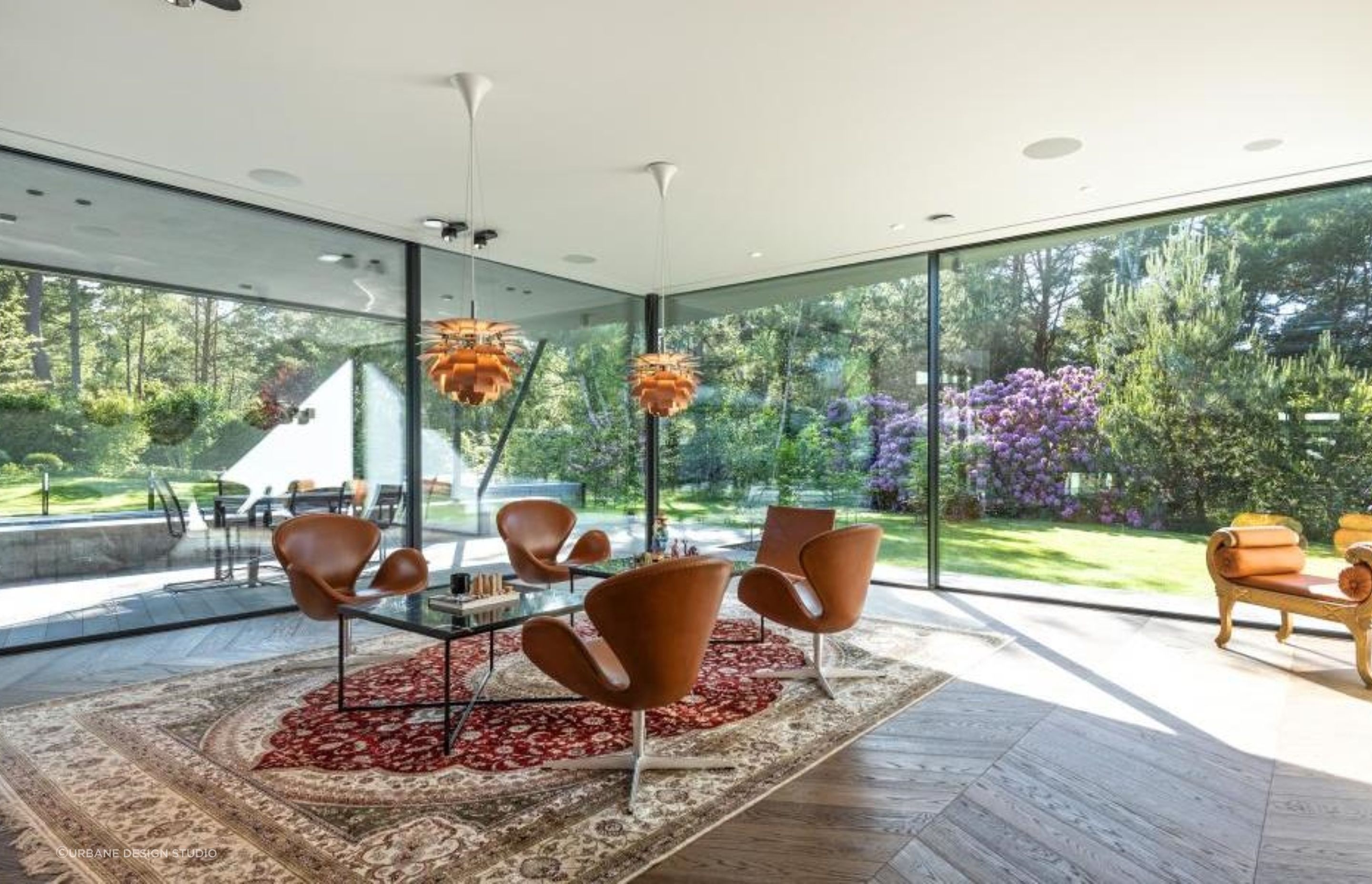 This Sweden home's window and door system is by Grupo Sosoares - Portugal and uses an OS double and OS triple minimalist sliding system. Architecture by Realestelligenece (part of Investelligence Group).