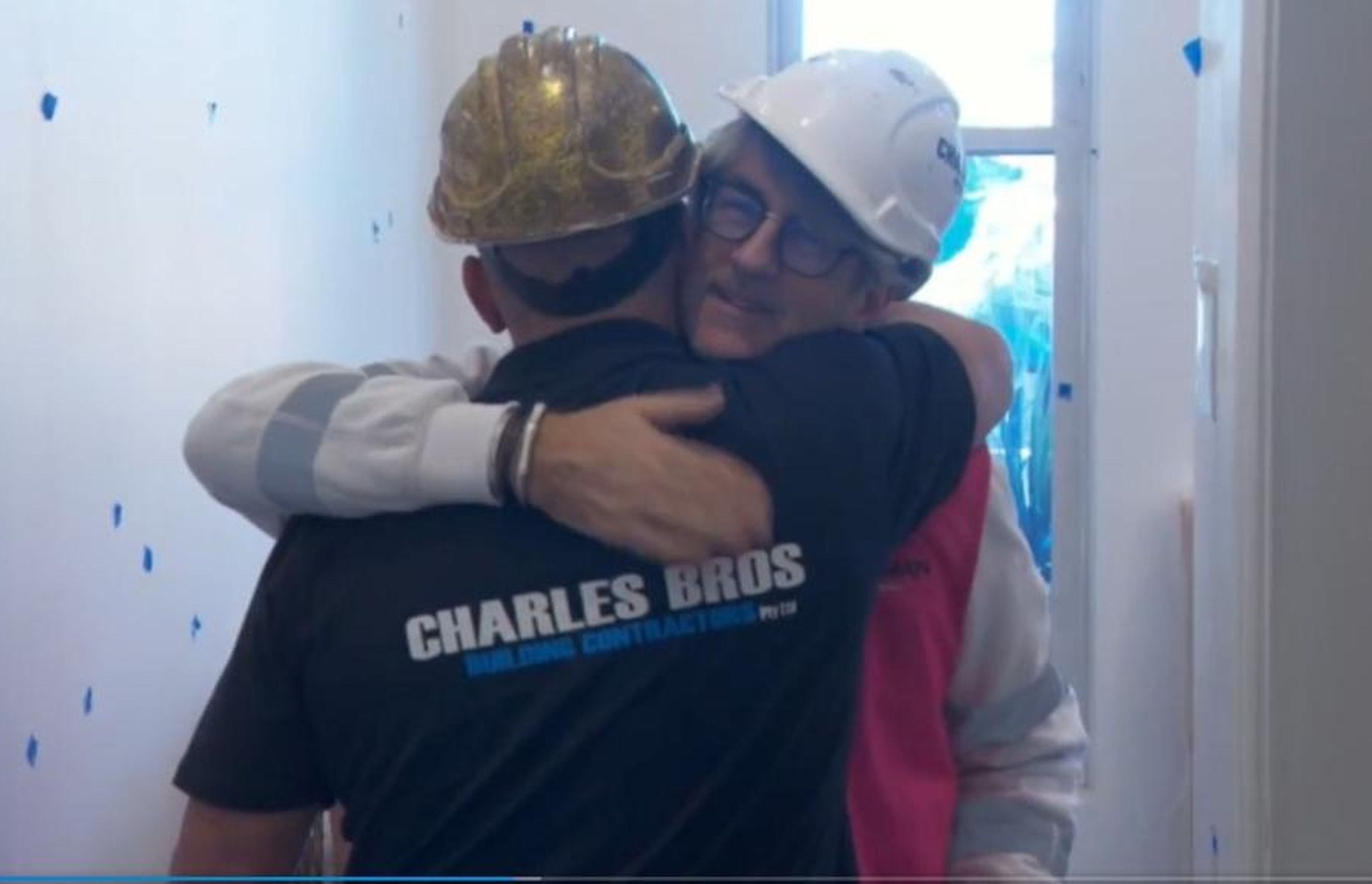 Tradie hugs - the real deal. Photo credit: realestate.com.au