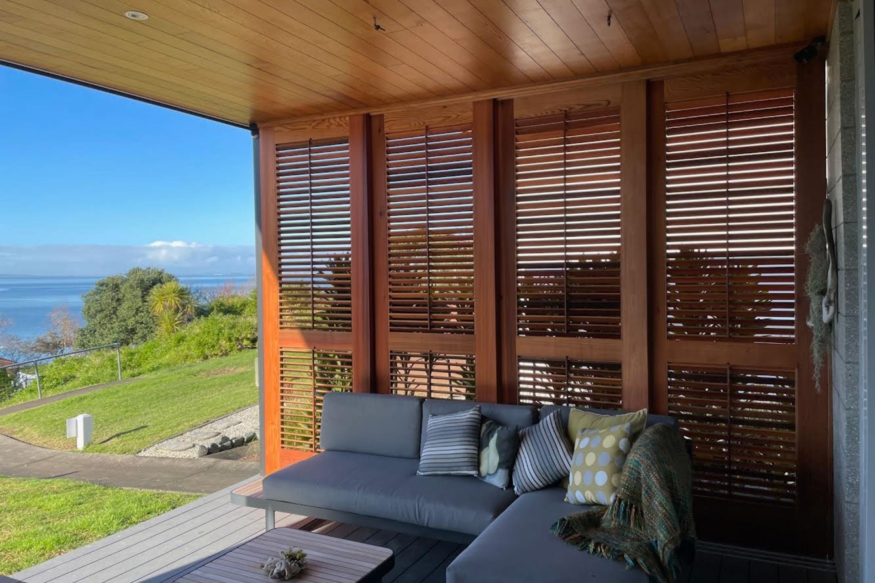 This red cedar privacy screen showcases Michael's expert craftsmanship, with adjustable louvres to control light and air flow.
