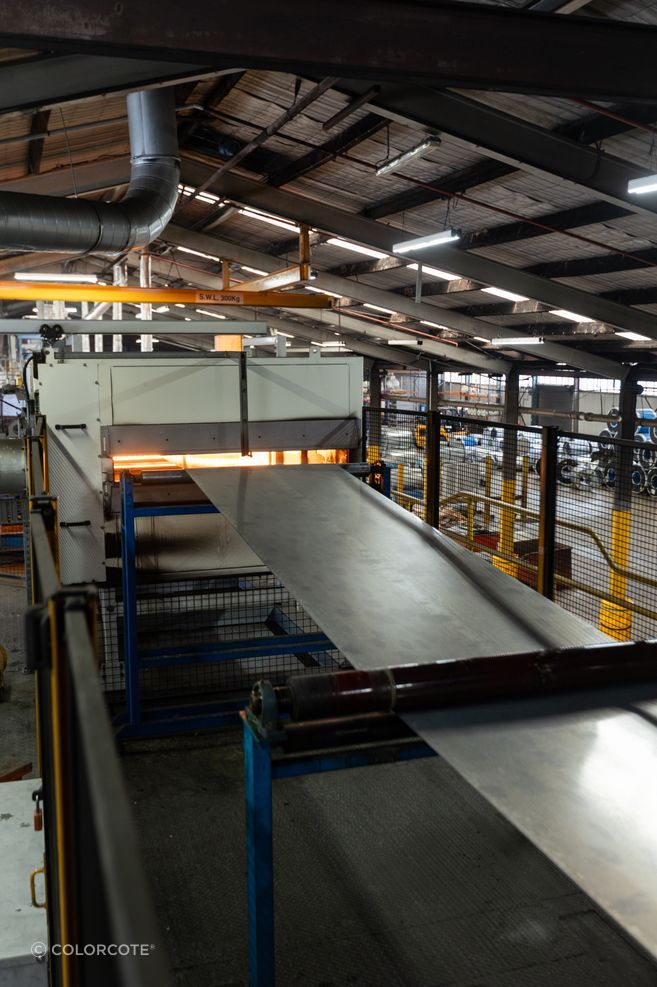 Steel going through the pre-treatment process via
ColorCote’s infrared ovens.