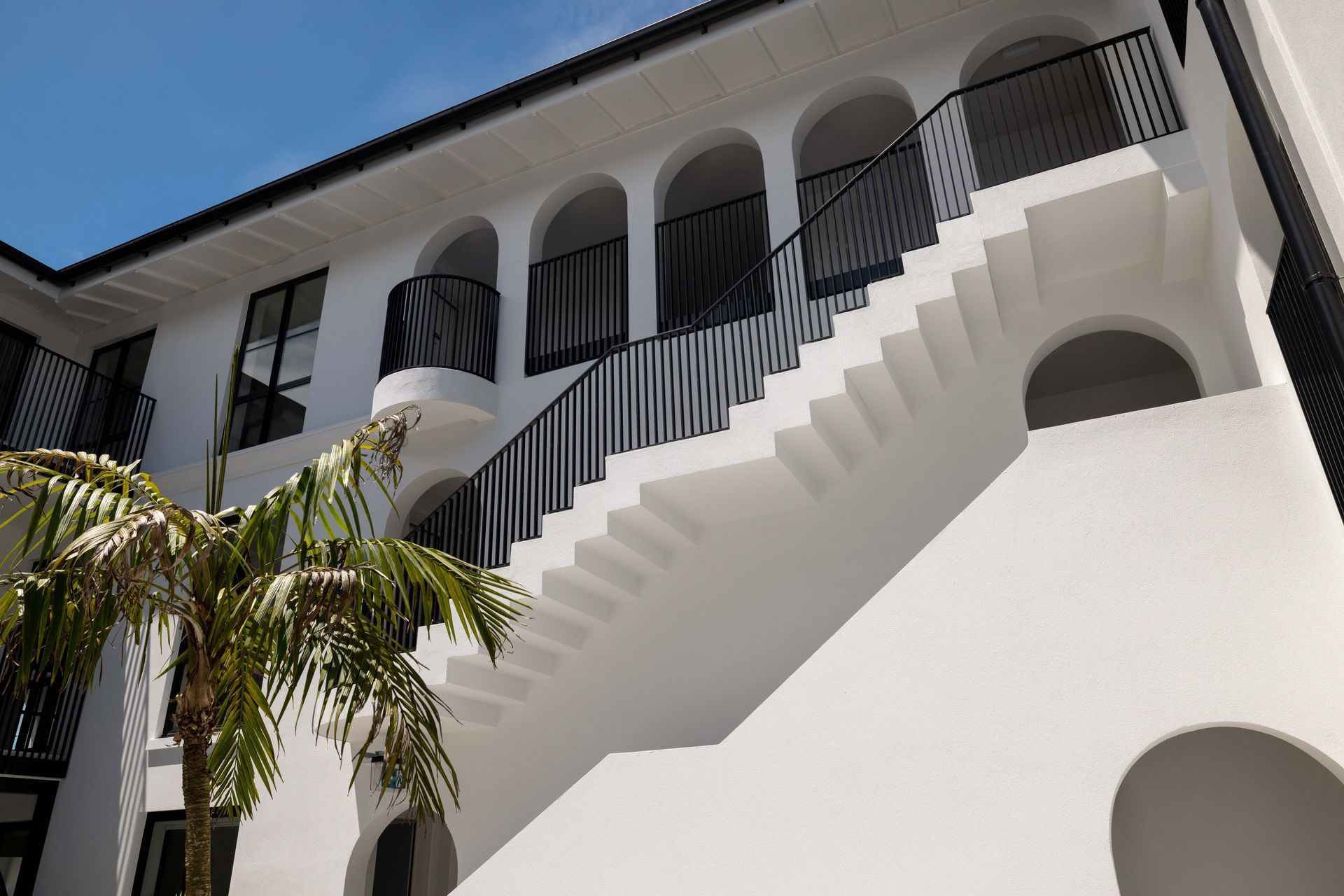 A stairwell protruding into the courtyard.