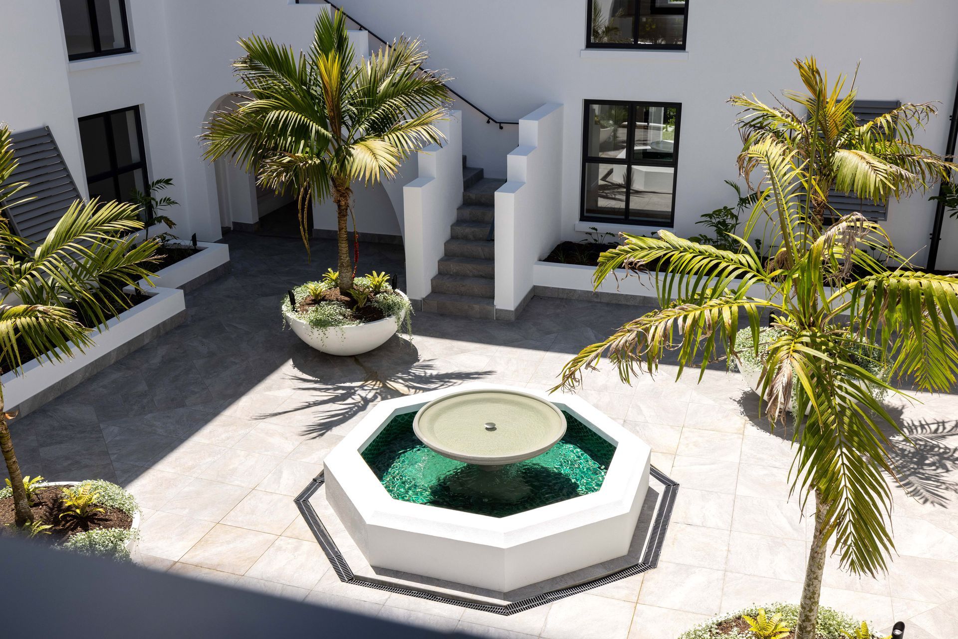 An integral part of the overall design, the courtyard was conceived with inspiration from California architecture.