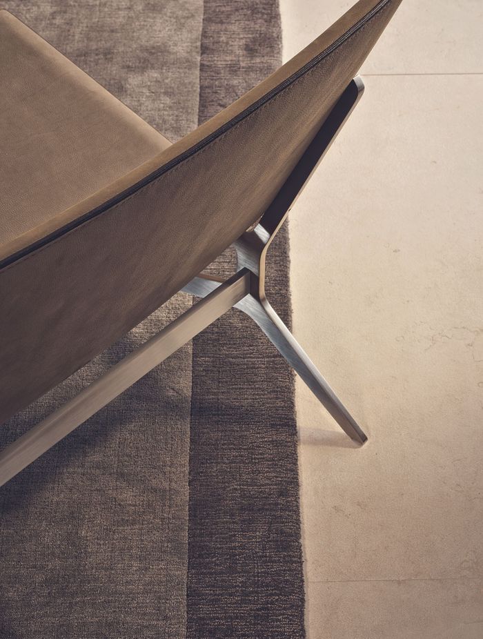 The Kay comes in fabric or leather and captivates with its clean lines