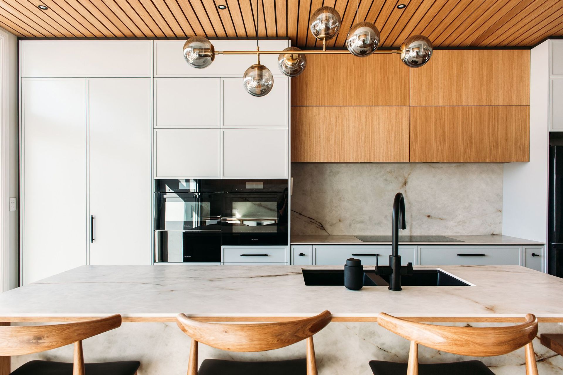 And after in this villa kitchen design, NZ. Photo credit: Anna Briggs.