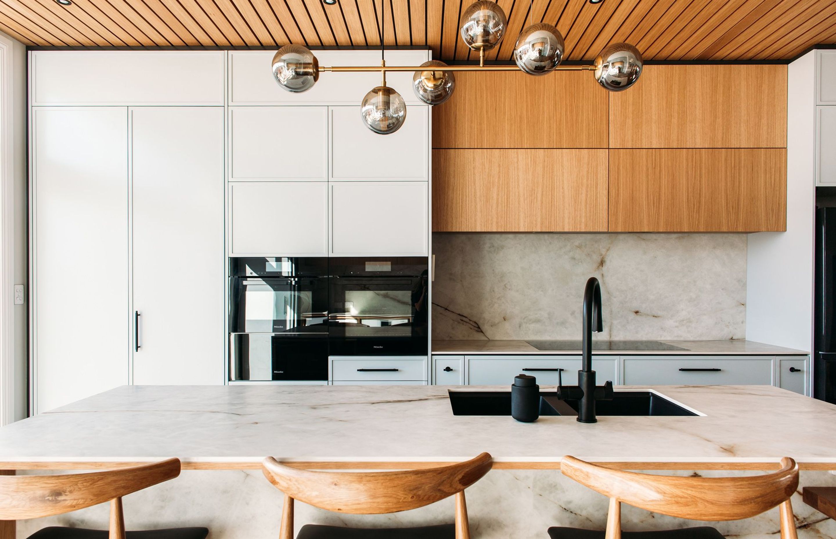 And after in this villa kitchen design, NZ. Photo credit: Anna Briggs.