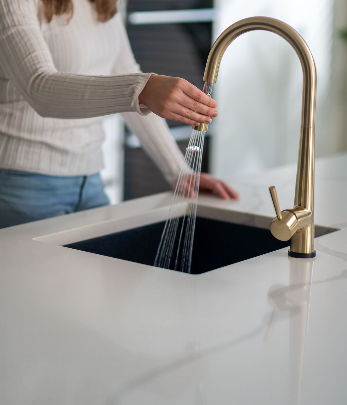 The Galiano pull-down sink mixer with Kontact technology.