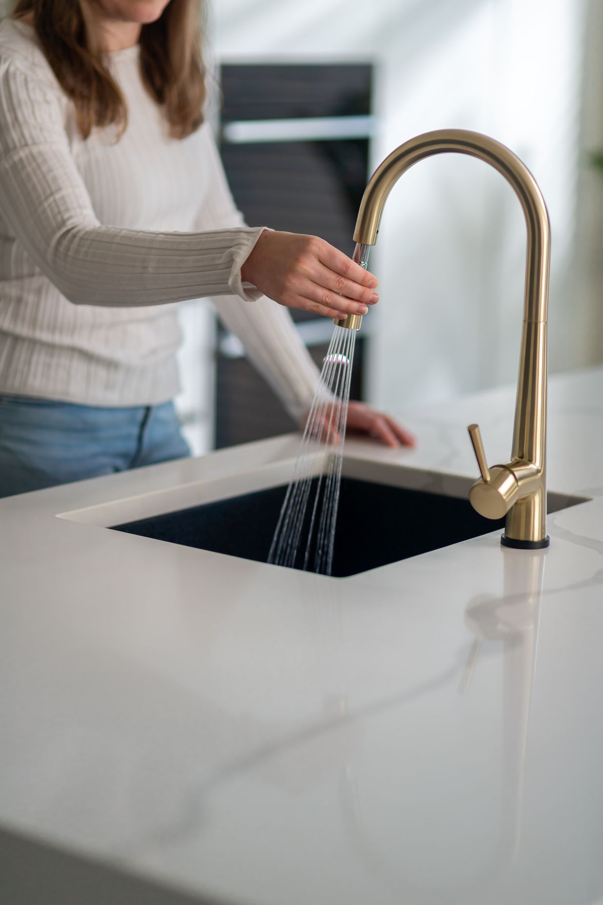 The Galiano pull-down sink mixer with Kontact technology.