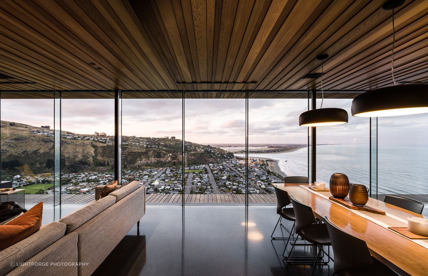 The dramatic gloss black concrete floors throughout were achieved with PeterFell oxide 699, and finished in a gloss sealer.