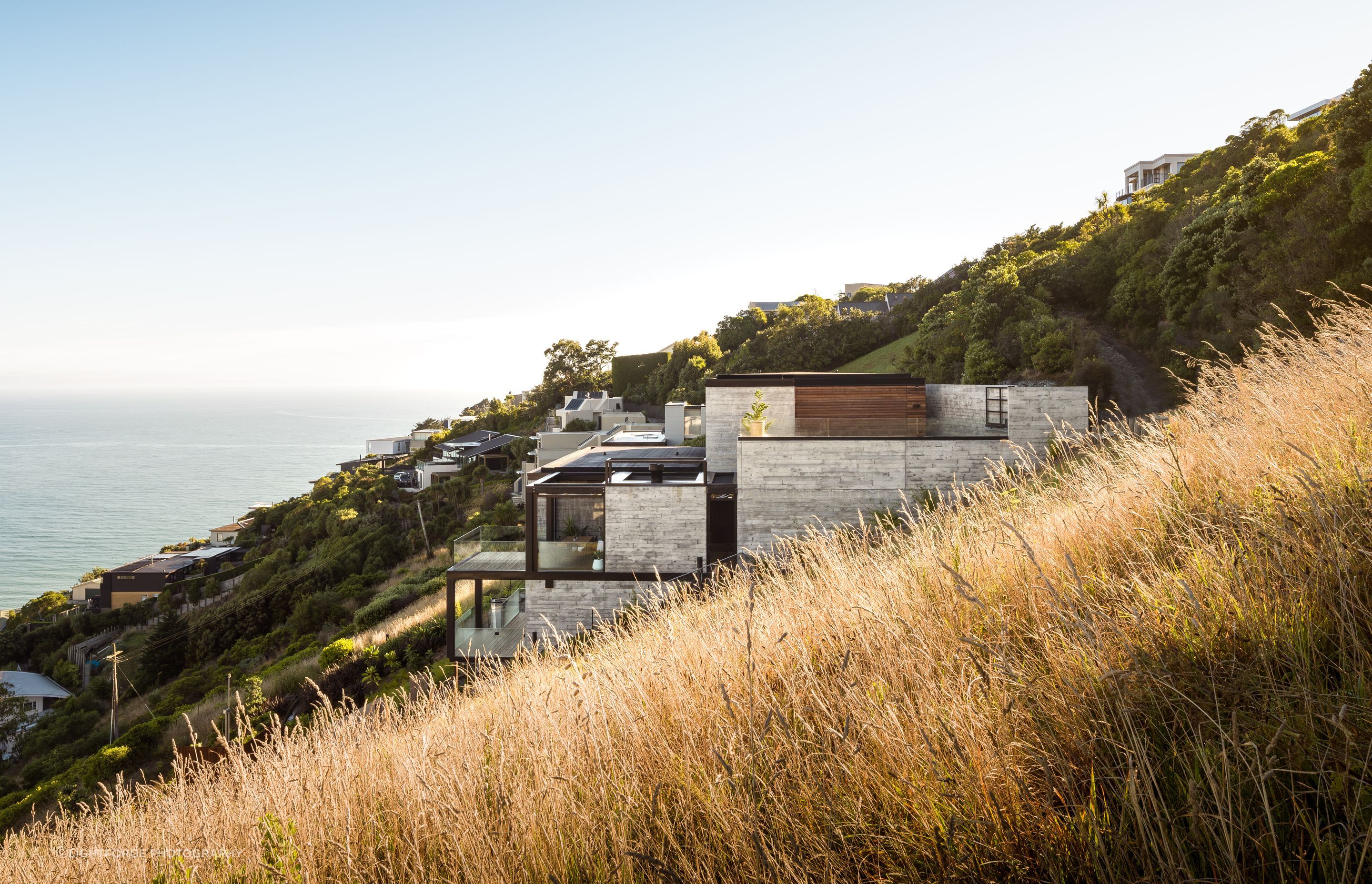 This Christchurch home overlooking the sea is constructed entirely in in-situ concrete due to access issues to the site.