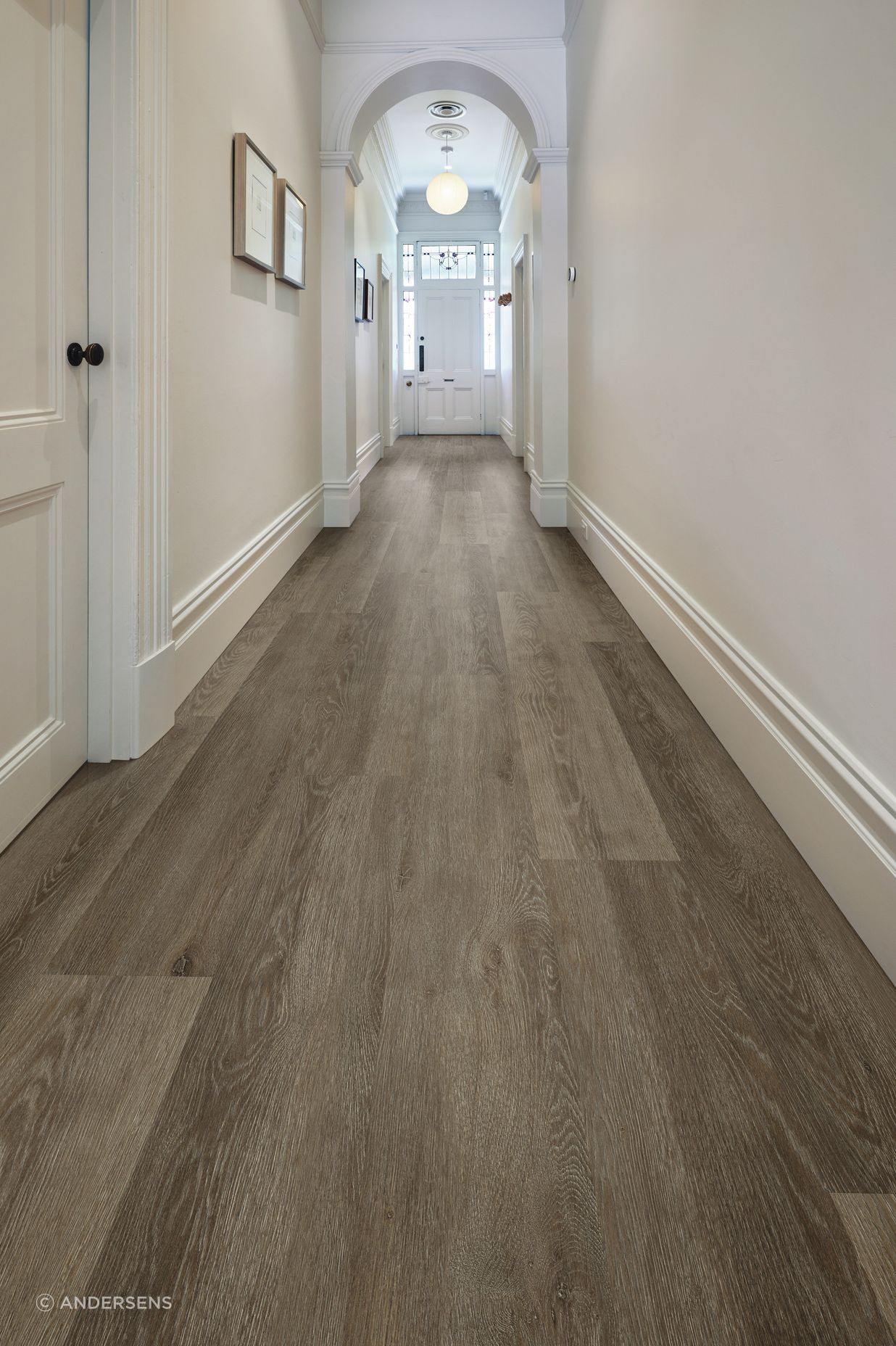 A traditional character hallway gets a slick new flooring update with vinyl longboard flooring.
